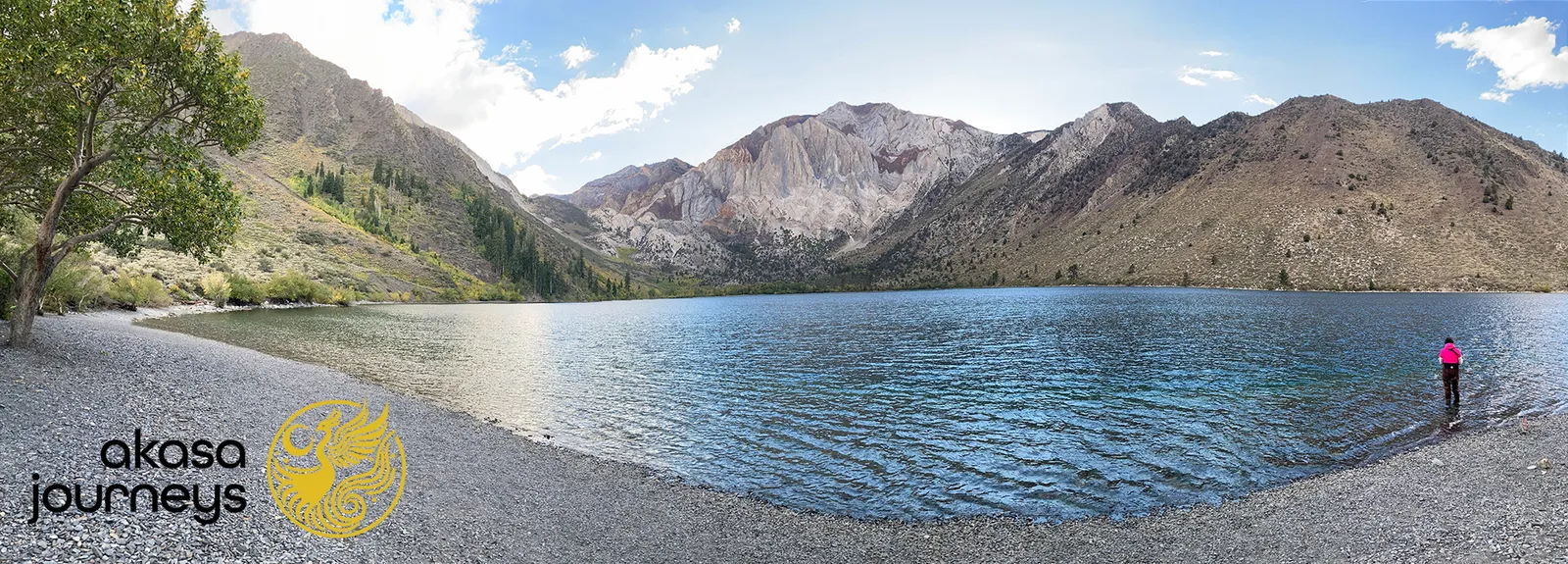 beautiful lake with a lone person on a journey